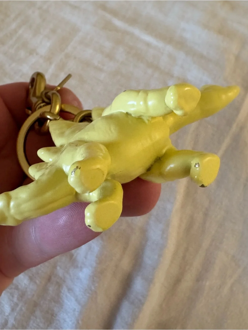 Coach Yellow Stegosaurus Keychain Charm